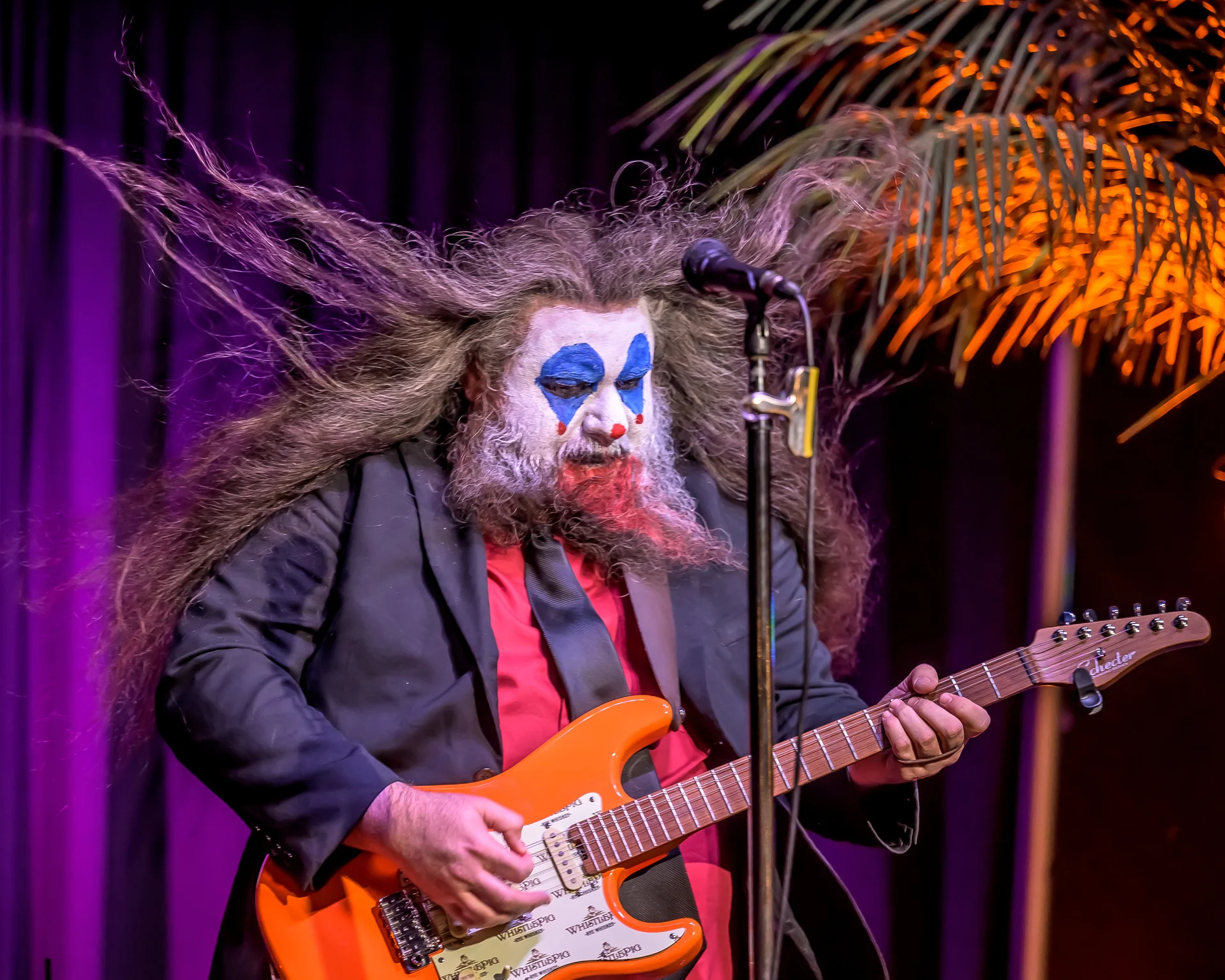 Kelsey performing in costume at a Halloween Secret Show